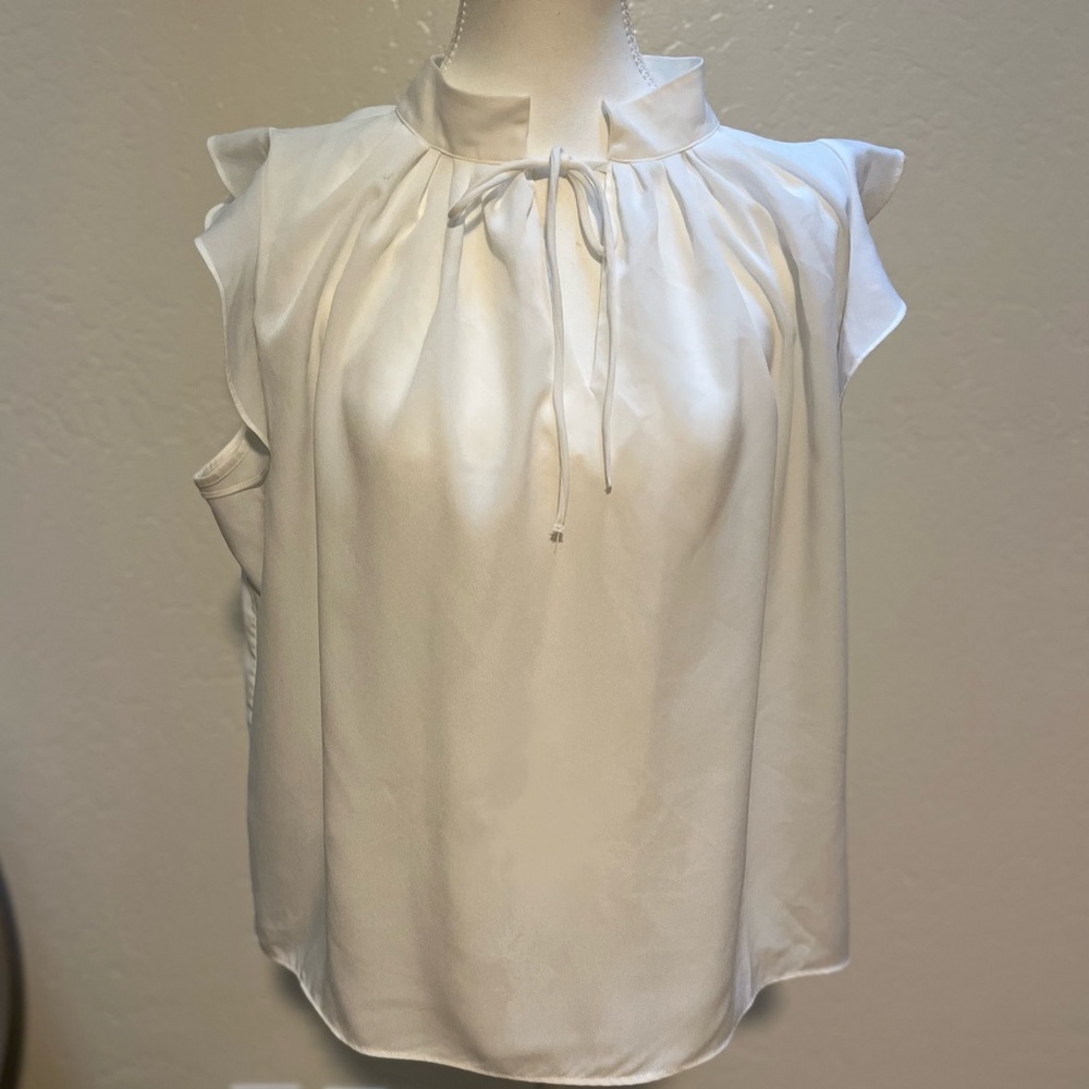 White flowy blouse